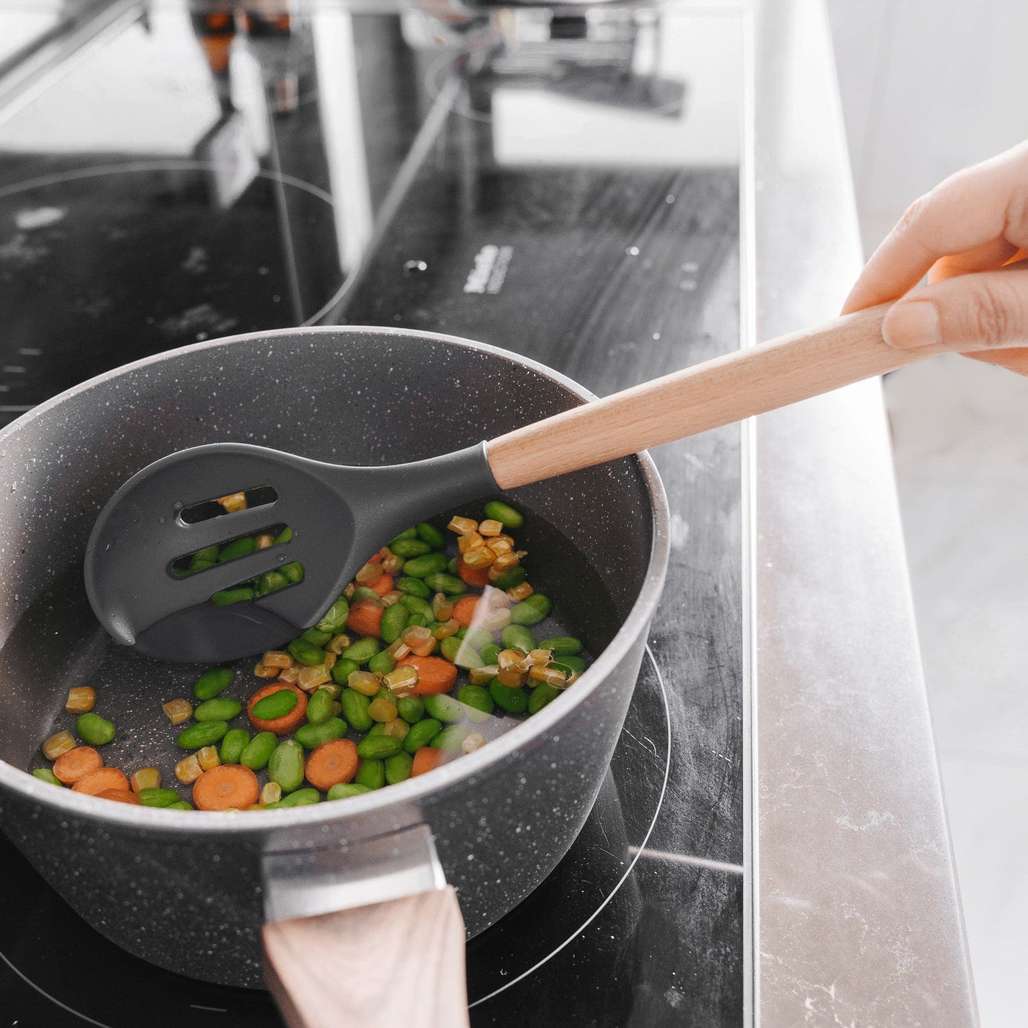 Beechwood & silicone slotted spoon charcoal
